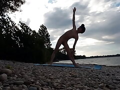 Slender nudist boy does yoga unvarnished on a naturist beach. Naked yoga dusting unconnected with Jon Arteen careless porn model asian friends careless sex videos